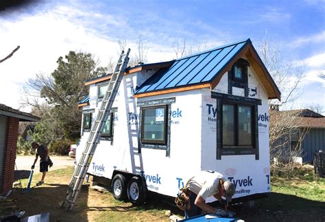 cutved roof tiny metal house|tiny house metal roof.